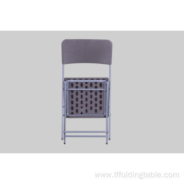 Plastic rattan chair with metal legs